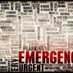 This is a word cloud design focused on the theme of "Emergency." It features a variety of words and terms associated with urgent situations, prominently highlighting the words "EMERGENCY" and "URGENT" in bold red letters. Other words, such as "planning," "response," "medical," "assess," "danger," and "immediate," are arranged in varying sizes and orientations, creating a textured visual related to emergency preparedness and response. The background has a distressed, textured look that contributes to the overall urgent and serious tone of the image.